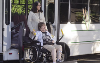 Elderly woman using senior transportation services