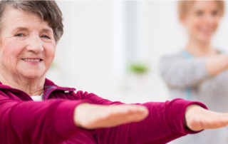 Senior woman performing low-impact exercises