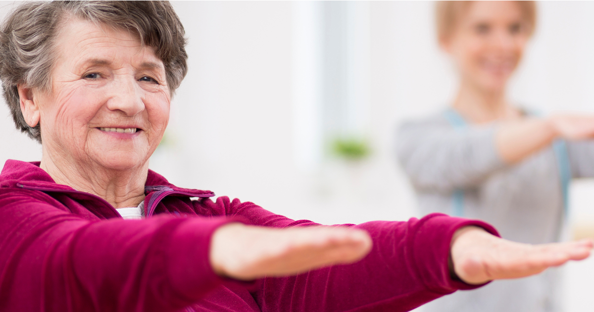 Senior woman performing low-impact exercises