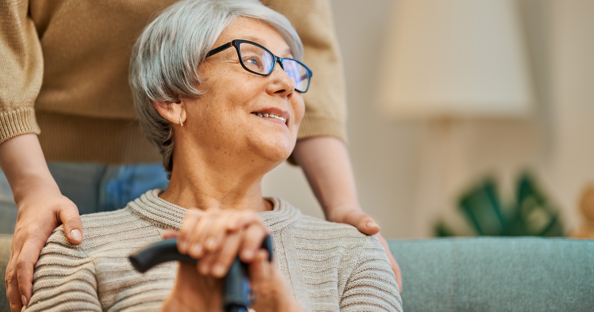 Senior woman with cane