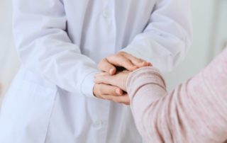 A doctor effectively communicates with a Parkinson's patient.