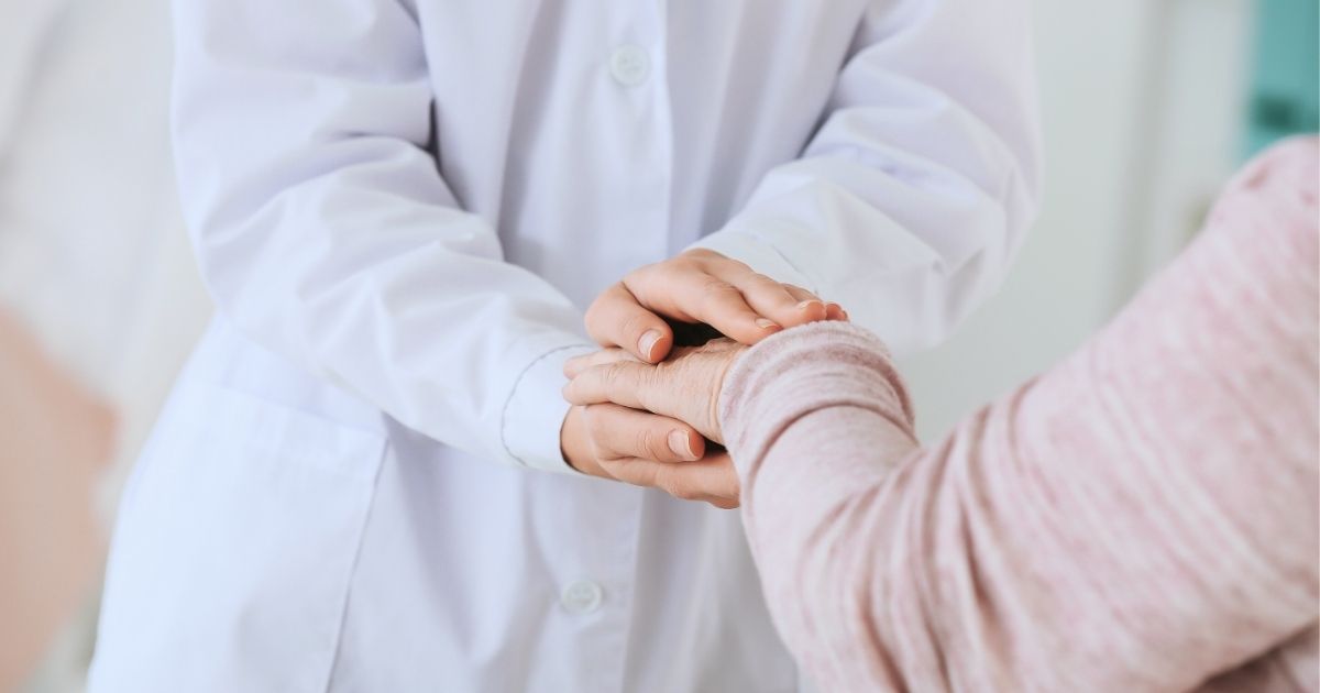 A doctor effectively communicates with a Parkinson's patient.