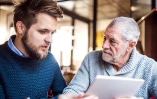 A young man talks to his aging parent about receiving care.