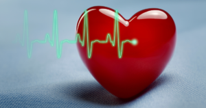 A heart shape and heartbeat and a EKG symbolize American Heart Month.