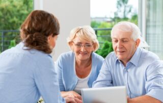 A daughter discusses caregiving options with her elderly parents.
