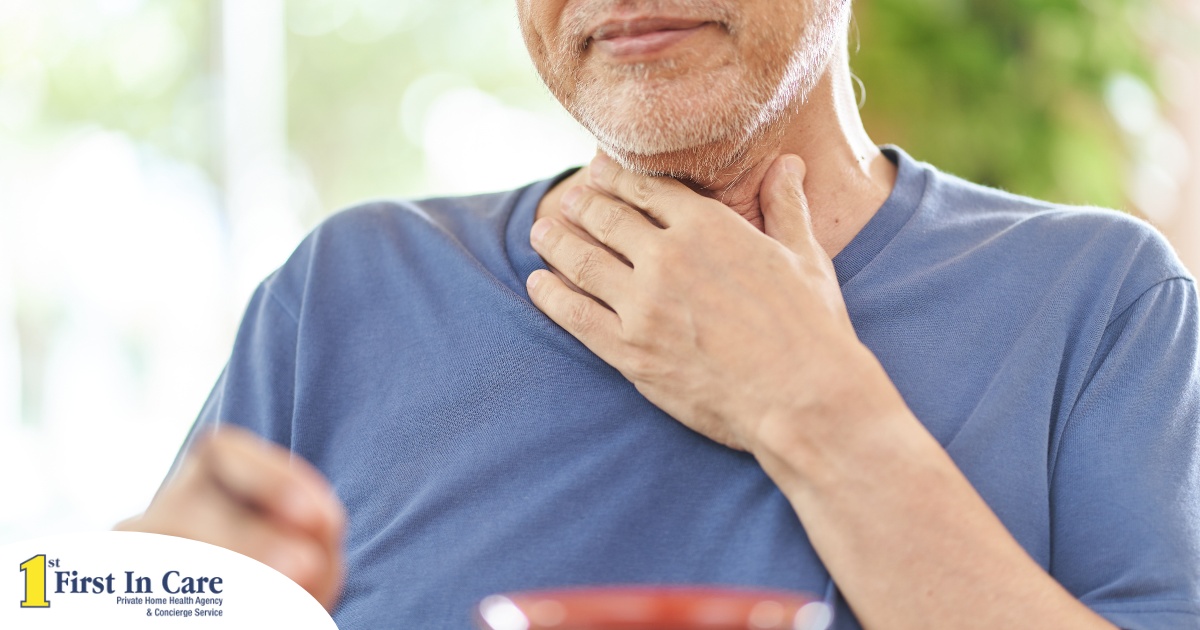 An older adult holds his throat representing dysphagia which can affect senior health.