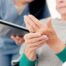 A caregiver provides in home care services to a senior with arthritis