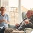 A caregiver provides Memory Care at Home to a senior