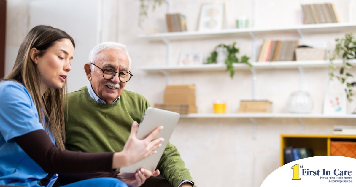Telehealth and Senior Care Home caregiver assisting senior man to use telehealth and senior care